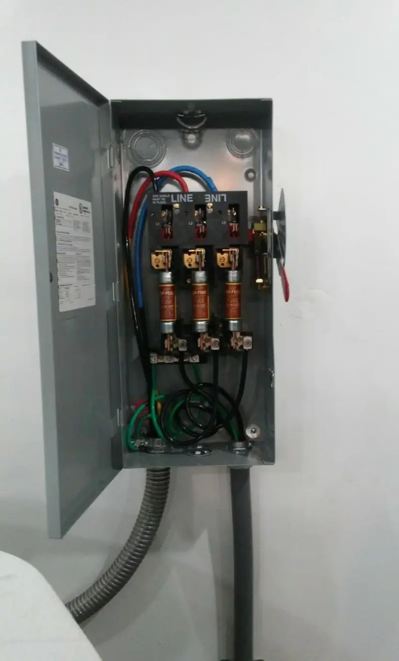 Three-phase disconnect switch installed for Smoke Detector Installation in Schriever